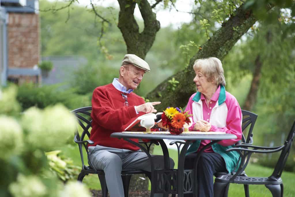 seniors enjoying an outdoor conversation