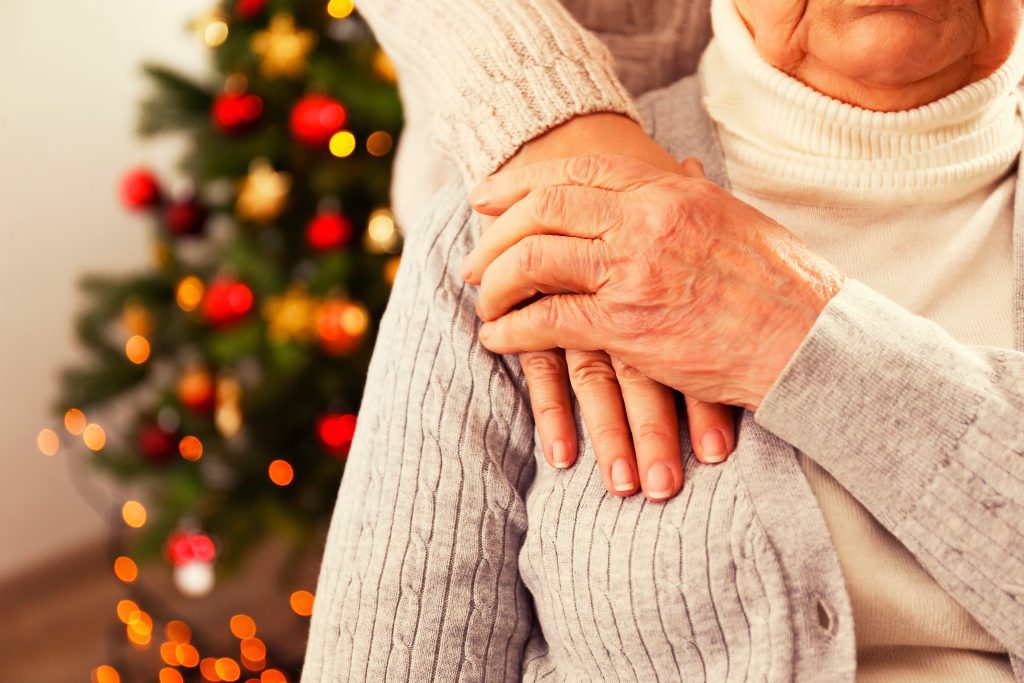 a resident being visited by her loved ones